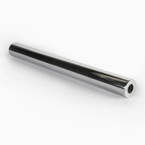 A photograph of a polished aluminium tube section on a white background with a soft shadow to the left side of the tube grounding it. There are long black reflections and a small white highlight that runs along the length of the tube emphasising how polished and shiny it is. The tube is thick leaving only a small hole running through the centre.