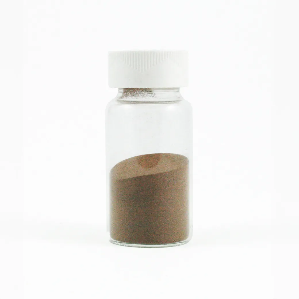 Small glass jar of copper powder